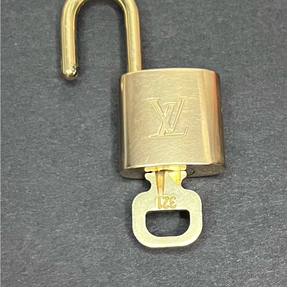 Authentic Louis Vuitton Gold Padlock and key #321